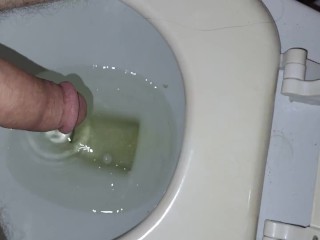 Peeing nd horny in public hotel bathroom 