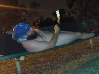 Rubbing my cock on a public bench while pissing on myself