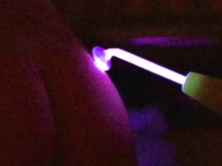 close up neon wand zaps