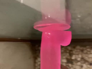 Cute boy having fun with dildo in shower