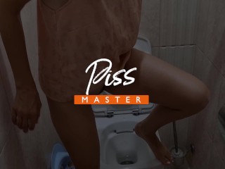 Sexy MILF pissing into a toilet in the morning. Closeup. Golden Rain