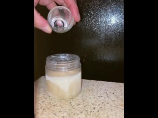 Pouring a fresh load of my cum into my frozen cum jar