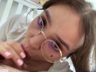 Cumshot on petite beauty face in glasses