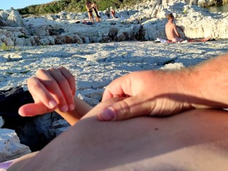 Milf loves to get touched with people around on the beach 