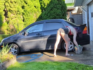 Sexy t4t trans woman washes her filthy car for the hungering maw of capitalism with a big glass plug