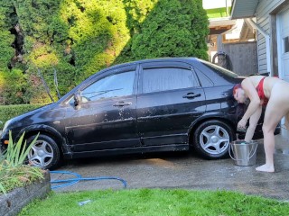 Sexy t4t trans woman washes her filthy car for the hungering maw of capitalism with a big glass plug