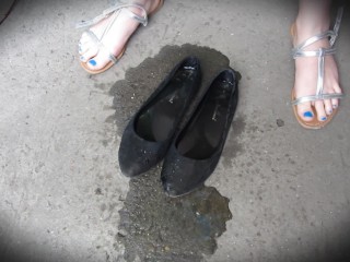 Pissing in slippers mature milf in the yard of an old house.