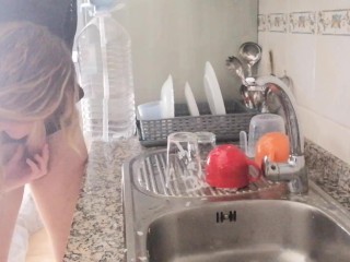 This girl uses my pissing cock to wash the dishes