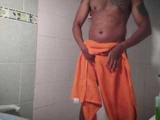 See me in towel cleaning the batroom after shower