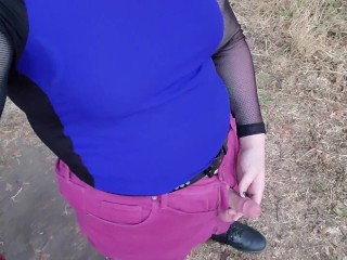 Tgirl takes a piss out in the open