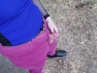 Tgirl takes a piss out in the open