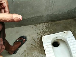 Indian boy pissing in bathroom