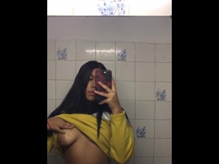 Flashing my tits in the public bathroom on camera - mirror selfie cellphone video girl natural boobs