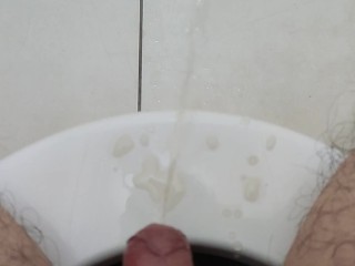 Sitting on the toilet and pissing all over the floor