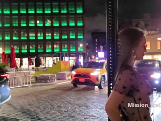 Changing into sheer dress on a busy downtown night