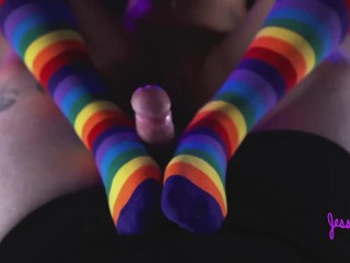 Cute and Flexible - She gives him a foot job with her rainbow socks on