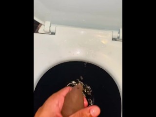 Foreskin play and fetish pissing on the commode seat Foreskin fetish pull and play uncut cock lovers