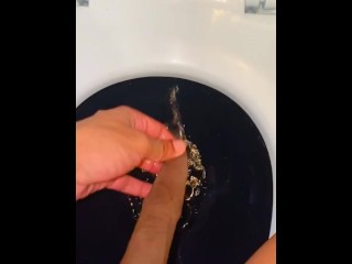 Foreskin play and fetish pissing on the commode seat Foreskin fetish pull and play uncut cock lovers