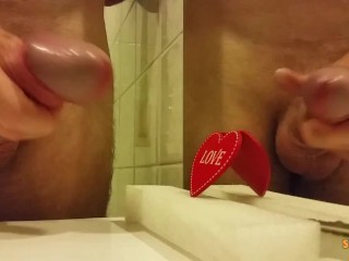 Jerking off on a heart shaped love, cumshot a lot of cum from a big cock by an handjob.