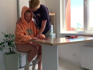 Alternative couple having hot sex in the kitchen