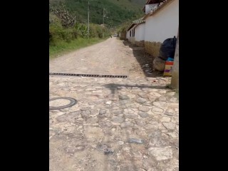 Two lesbians touch each other to orgasm on the corner of a town trying to avoid being seen by anyone