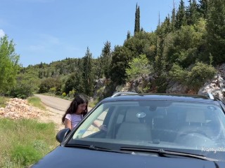 Crazy girl pissing on the roof of a car