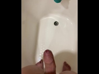 Guy desperately holding his piss until he loses control, spraying his piss everywhere,then orgasming