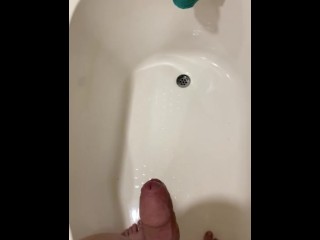 Guy desperately holding his piss until he loses control, spraying his piss everywhere,then orgasming