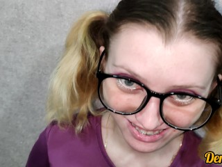 cutie with glasses gives a blowjob to get a lot of cum on her face and clothes