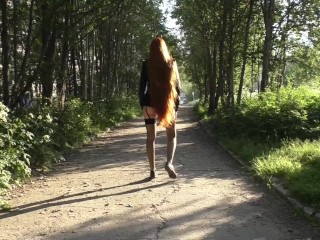 Summer walk in a mini skirt without panties