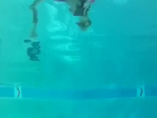 Face-up breathhold underwater ballerina dancer feet 