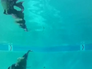 Face-up breathhold underwater ballerina dancer feet 