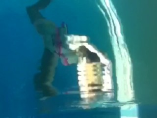 Face-up breathhold underwater ballerina dancer feet 