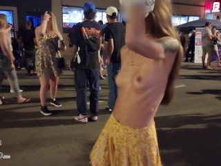 Going totally topless and flashing pussy at the street festival!