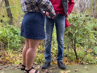 Horny wife and husband pissing together outdoors