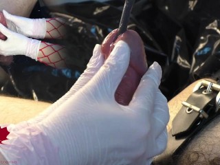 Mistress masturbates my cock with white gloves. I cum while she works my urethra with the dilator.