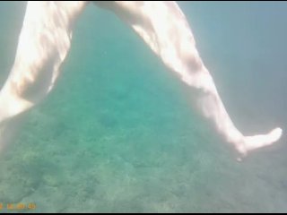 Public grabbing and fingering in the sea (no sound)