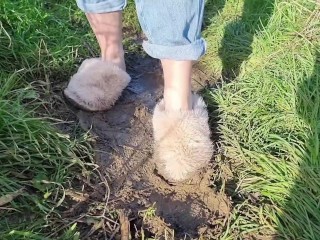 My fluffy white slippers got covered in mud!