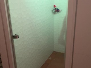 caught as a maid having fun in the shower with a rubber cock