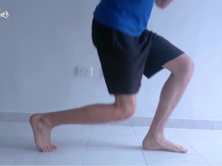 Long legs and sexy feet doing squats while stripping