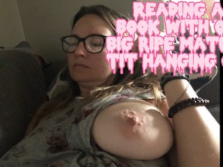 Caught this MILF reading a book with one BIG RIPE TIT hanging out, OOPS