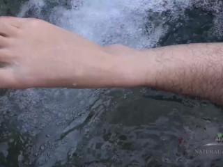 Curvy hairy brunette Simone Delilah strips in her hot tub and rubs her clit