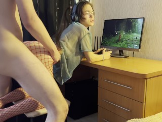 Schoolgirl with ponytails fucks and plays a video game