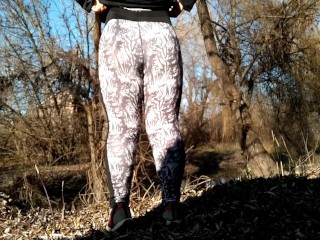 BBW MILF with big butt in leggings pissing outdoors while standing doggystyle