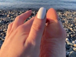 Hot and sexy feet of Mistress Lara in the sunset on public beach