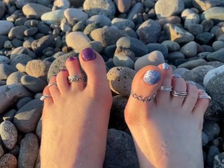 Hot and sexy feet of Mistress Lara in the sunset on public beach