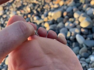 Hot and sexy feet of Mistress Lara in the sunset on public beach