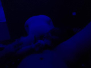 Petite ginger bitch sucking dick under blue light