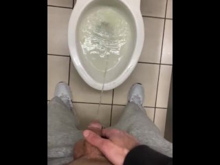 Making a mess in the airport toilet seat up pissed on floor moaning shy bladder