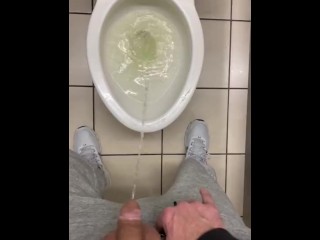 Making a mess in the airport toilet seat up pissed on floor moaning shy bladder